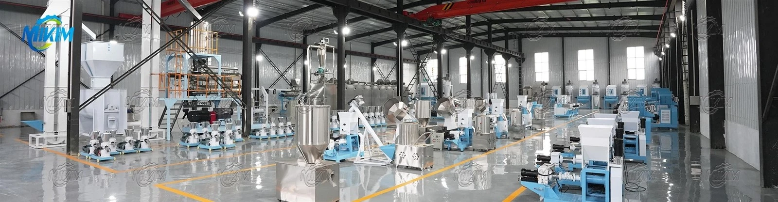 Fish feed extruder machine production line with dryer and crusher in MIKIM factory workshop Fish feed extruder machine production line with dryer and crusher in MIKIM factory workshop